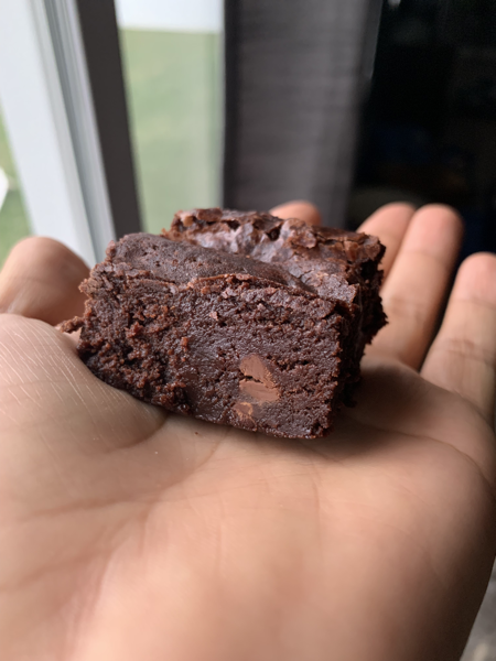 Vegan brownie detail in my hand, second angle